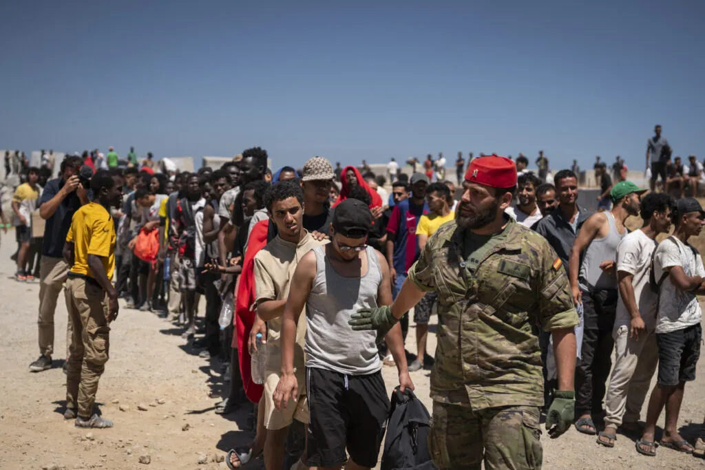 Migrants waiting for aid in Ceuta