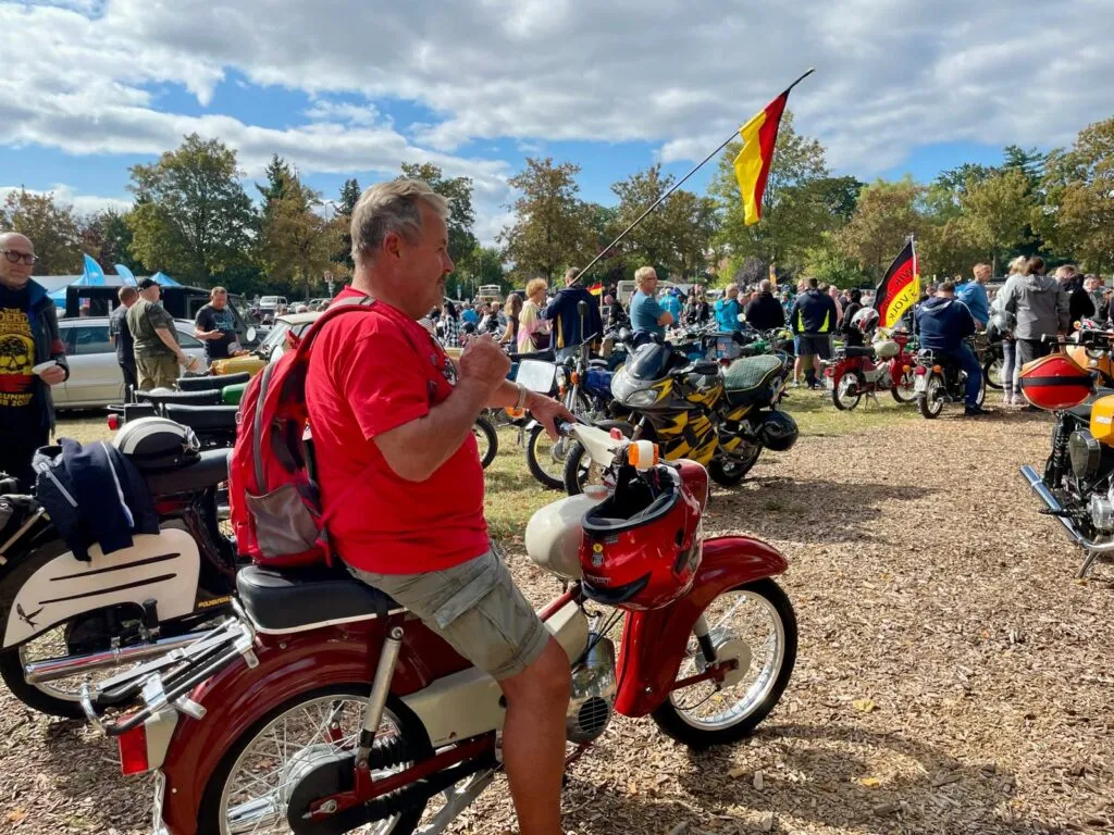 Michael Friedrich on his moped. Nette Nöstlinger