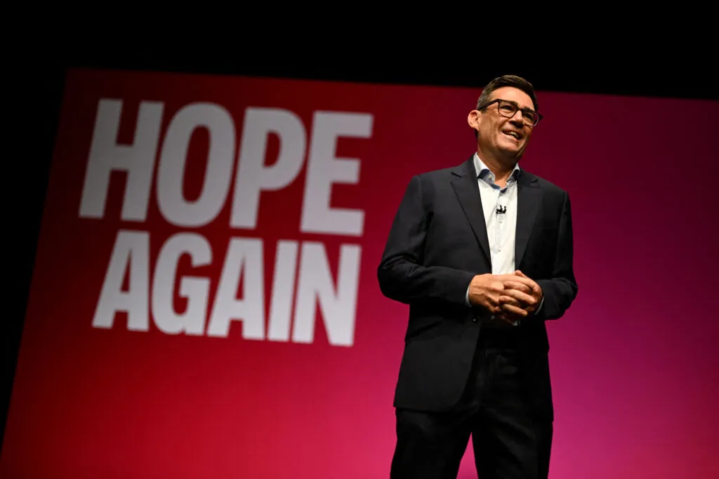 Andy Burnham speaking at a party conference