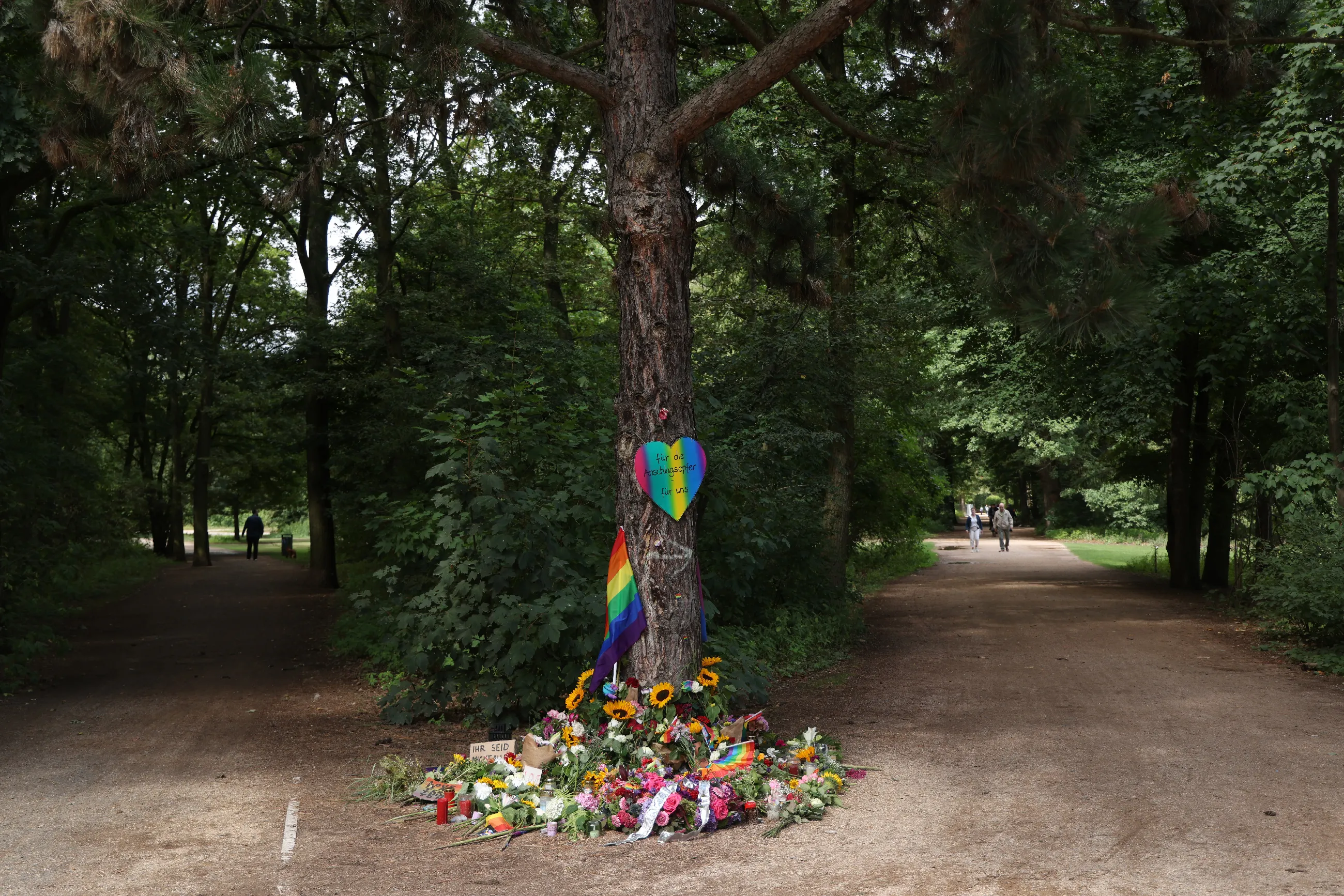 Flowers and candles at a makeshift memorial in Tiergarten park on July 27, 2026