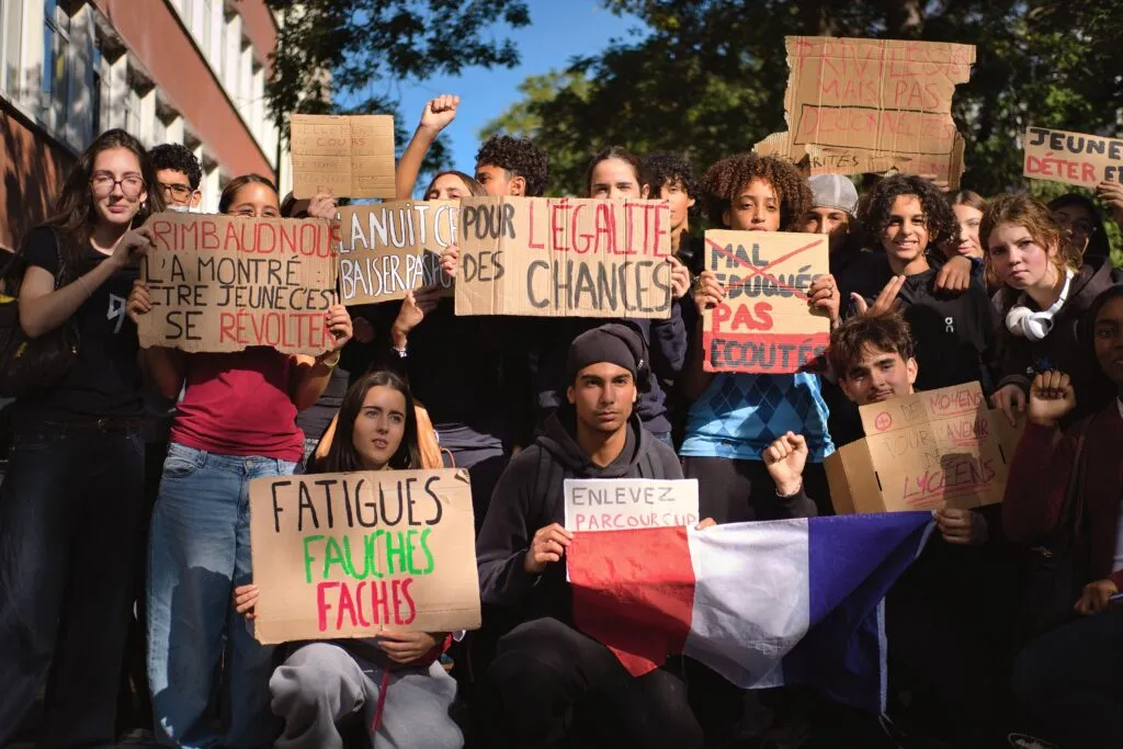 Students protest outside a Paris high school demanding more resources for public education
